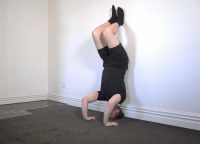 How to do a Wall Headstand Slides